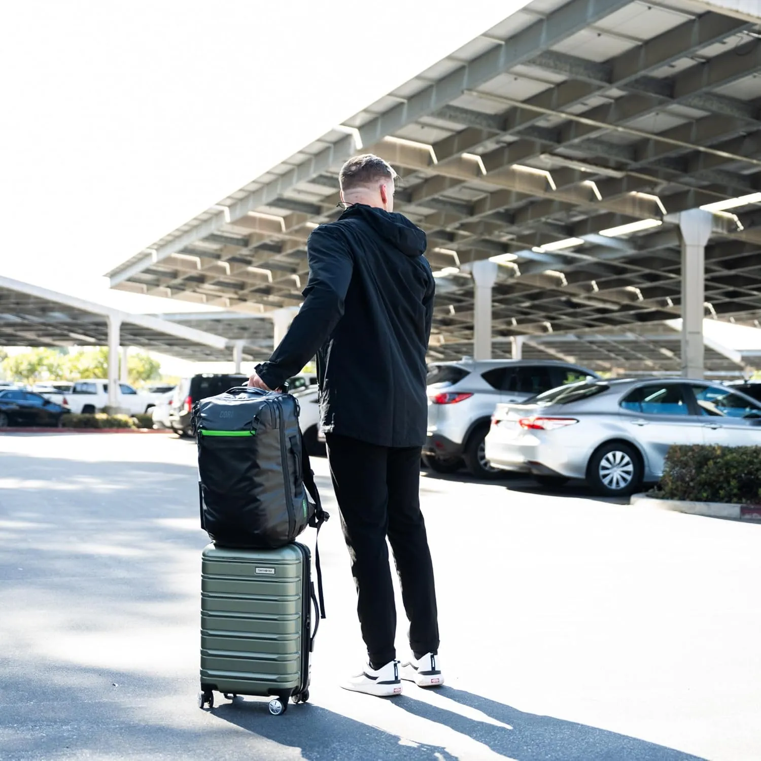 COR Surf 34L Carry On Travel Backpack | TSA and Airline Flight Approved Personal Luggage Style Backpack | The Island Hopper 2.0 | 34L Matte Black Waterproof Edition | FREE S-Clip Included